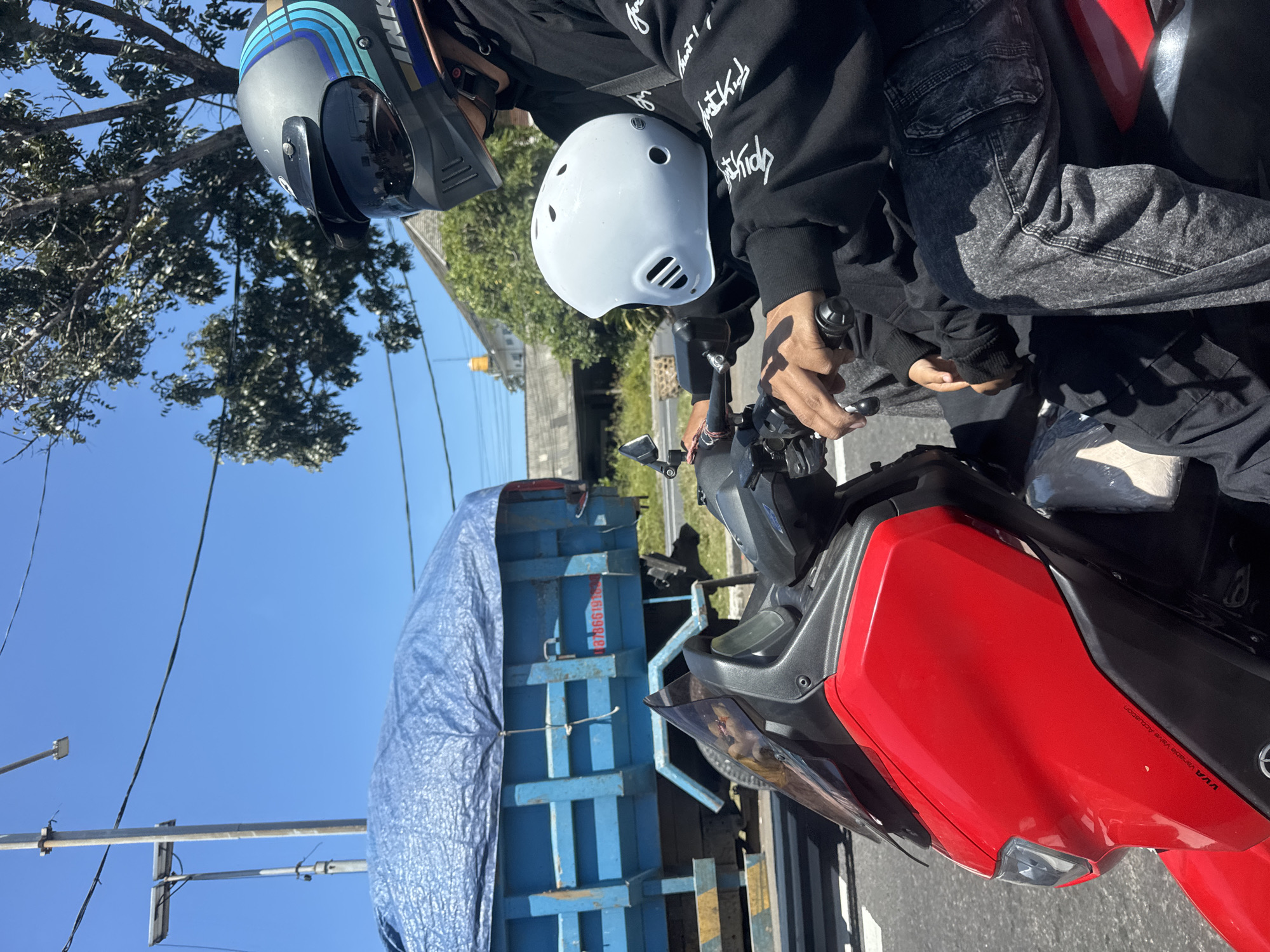 Early morning motorcycle traffic observed in Denpasar streets