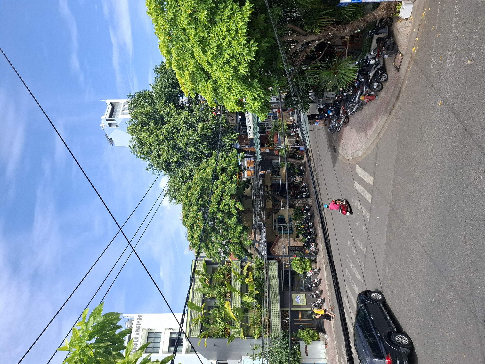 Nha Trang street corner with striking zigzag hotel backdrop