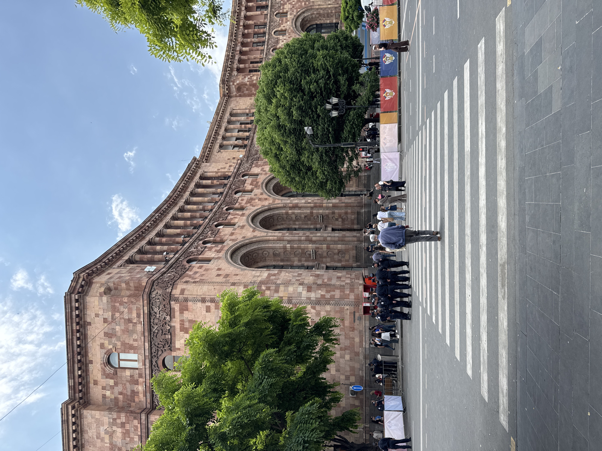 Military parade with officials proceeds through central Yerevan