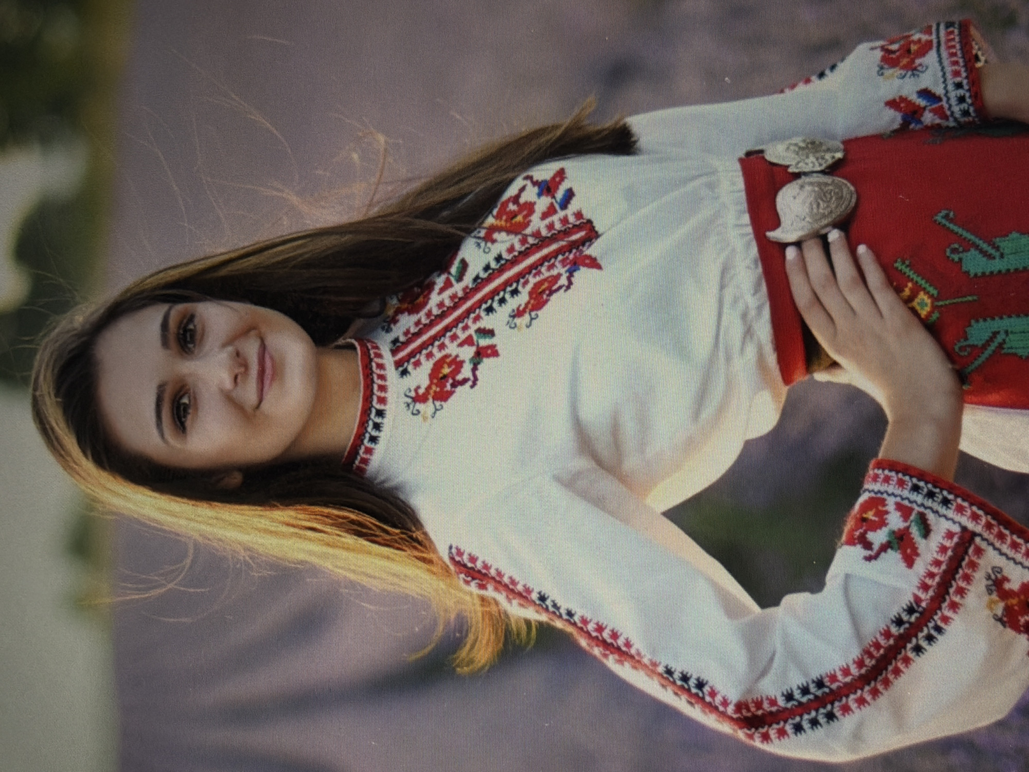 Traditional Bulgarian costume gathering documented in rose fields