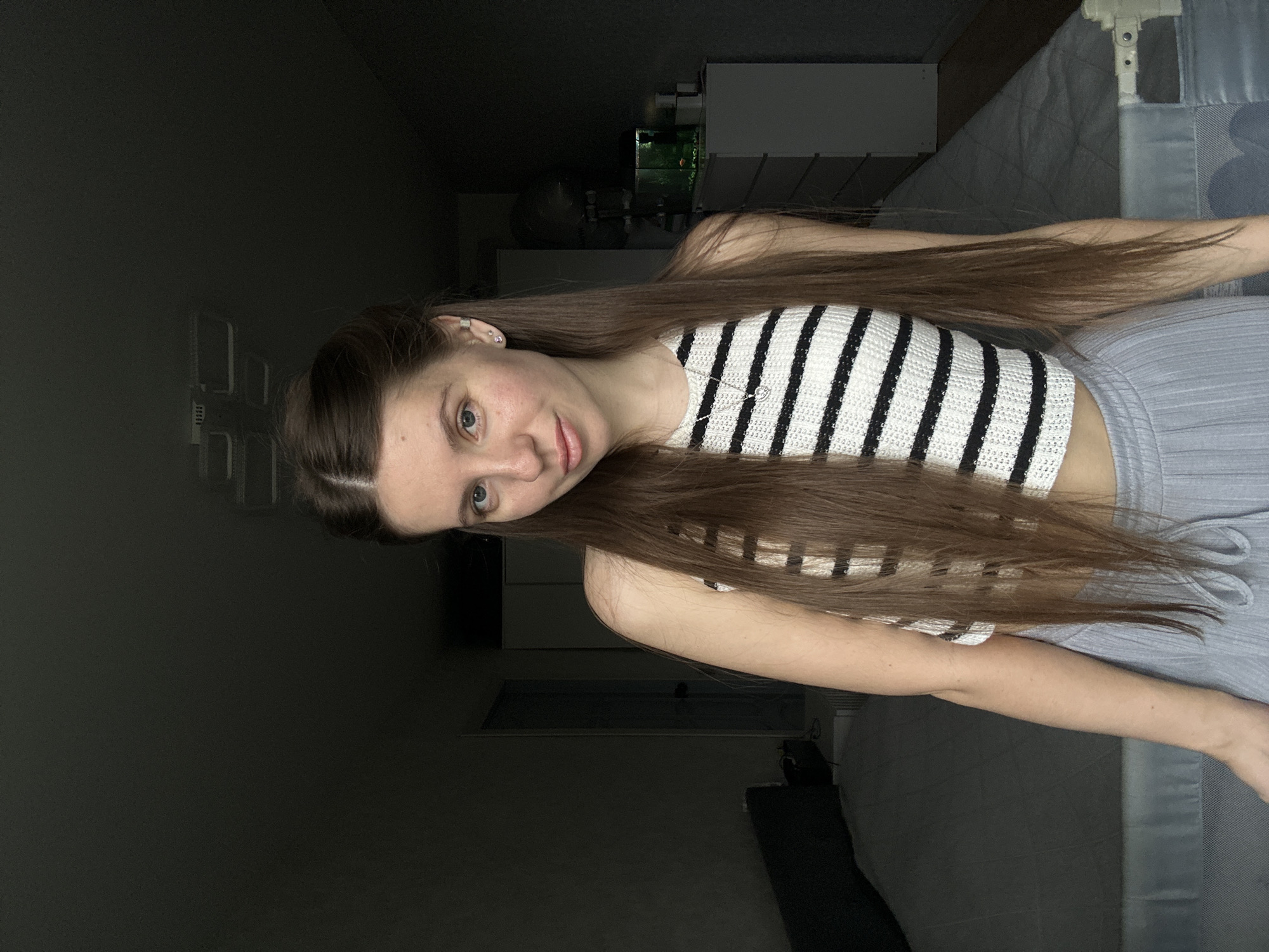 Woman photographed posing in bedroom in Klin, Russia