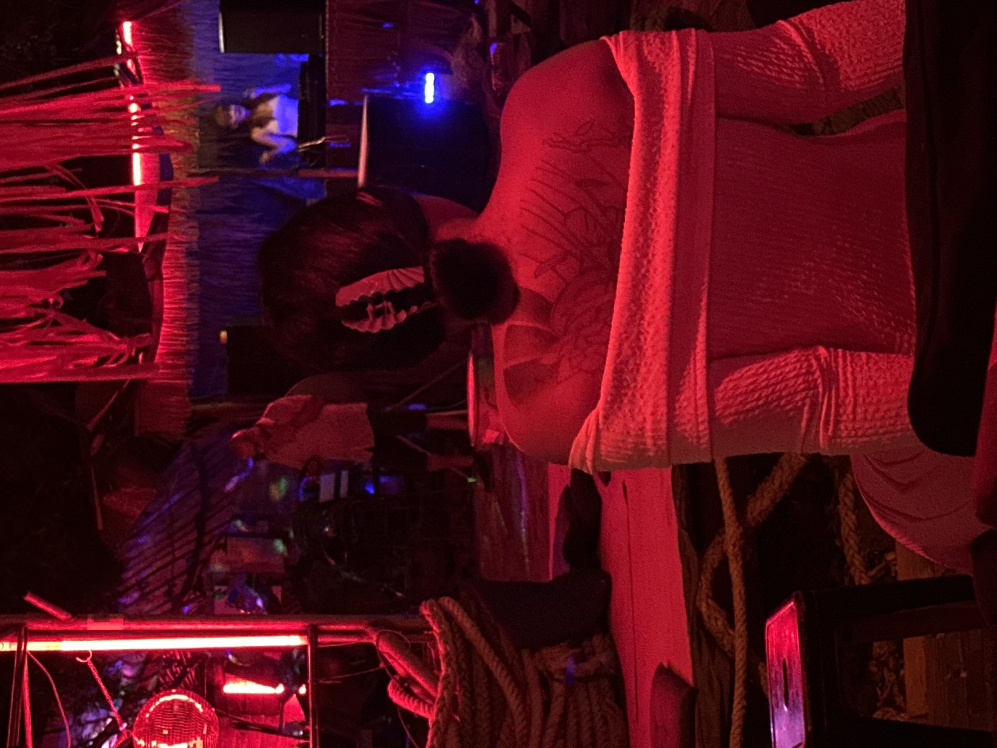 Red-lit bar night in Koh Phangan with DJs and neon décor