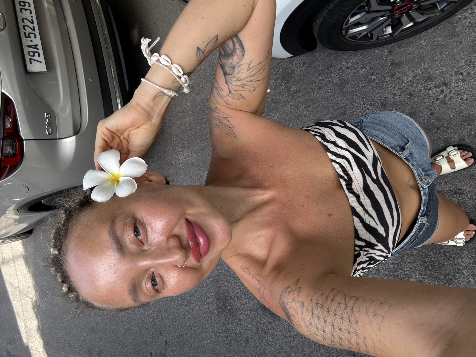 Selfie and parked SUV outside a Nha Trang commercial spot