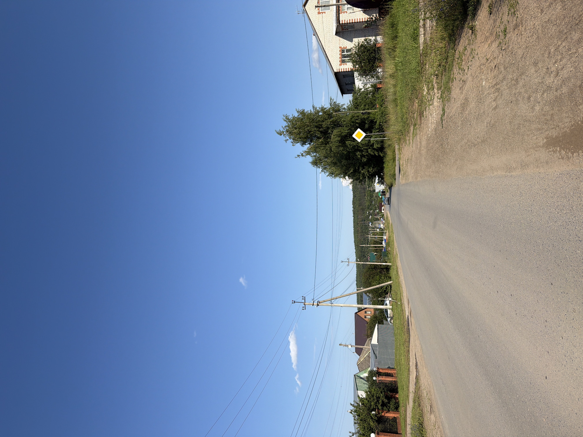 Quiet streets and residential corners of Chaikovsky on a sunny afternoon