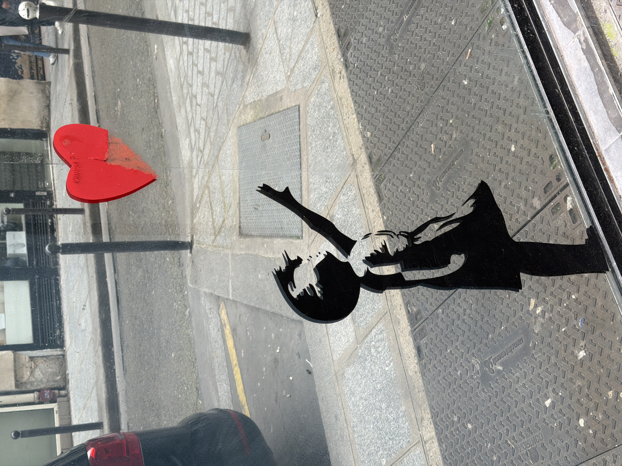 Banksy-style heart artwork spotted in Paris window display