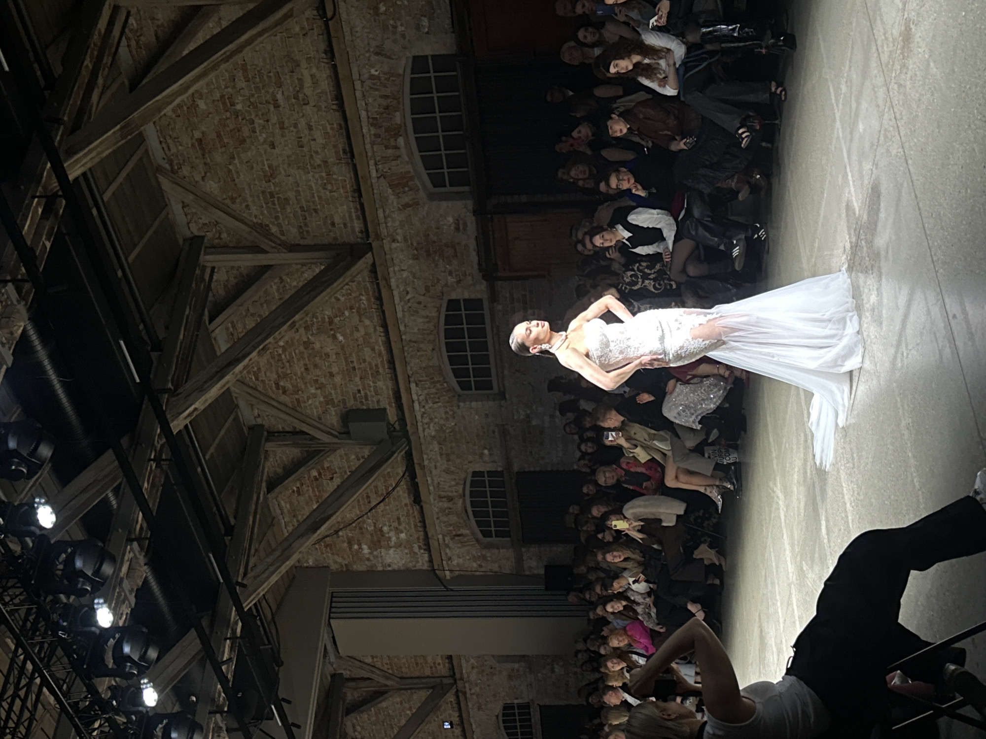 Bridal fashion show held in industrial venue in Riga