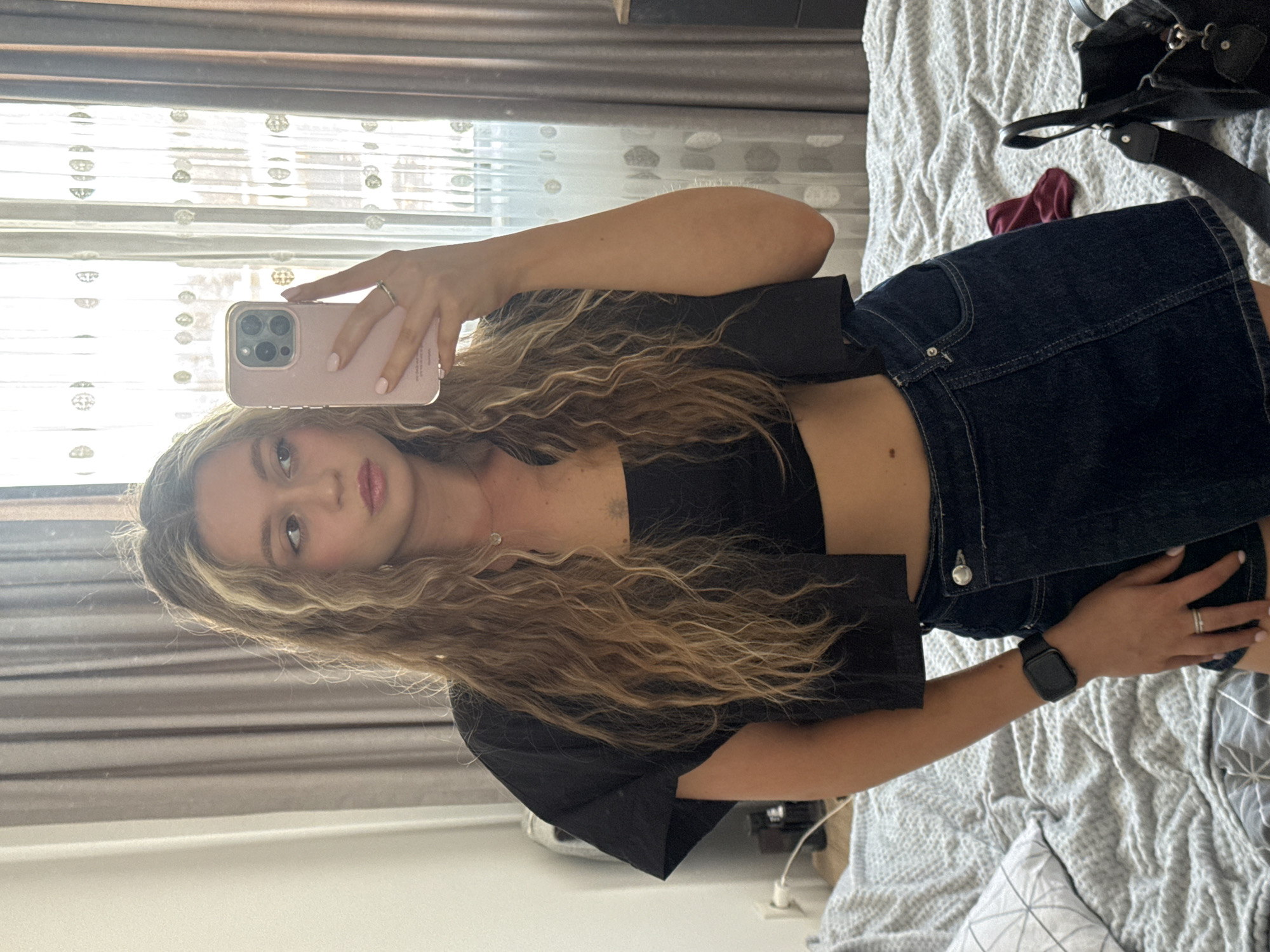 Woman takes selfie in Plovdiv room