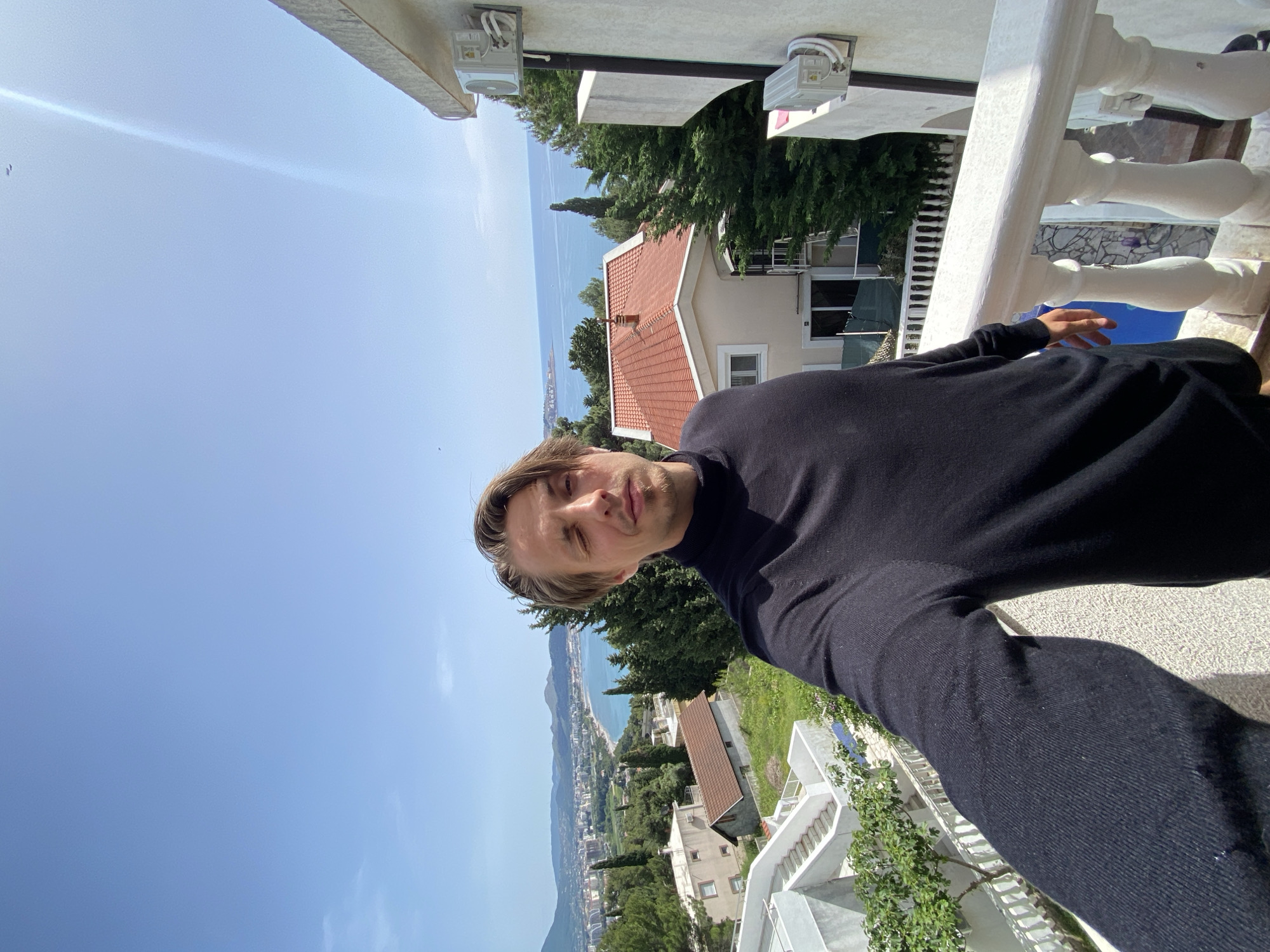 Tourist captures selfie overlooking Šušanj coastline in Montenegro
