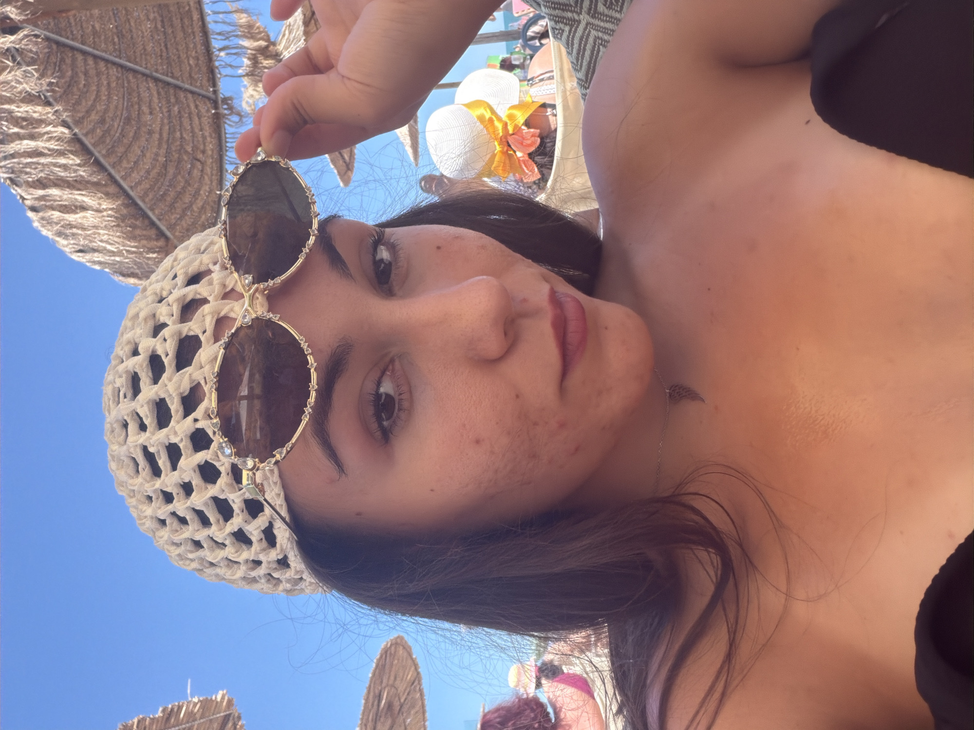 Sunny beach afternoon in Varna with selfies and straw umbrellas