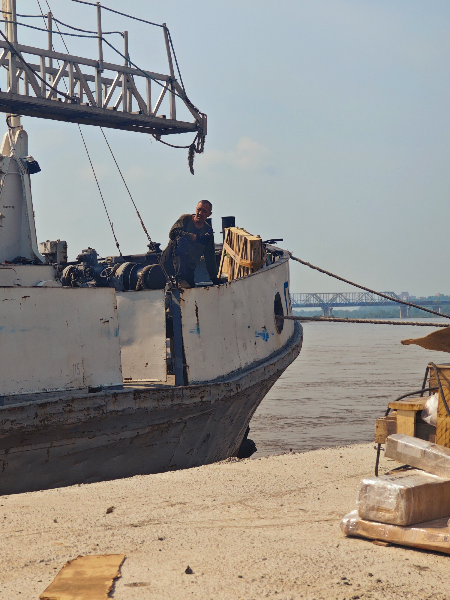 Heavy crane and barge operations at Krasnoyarsk river port
