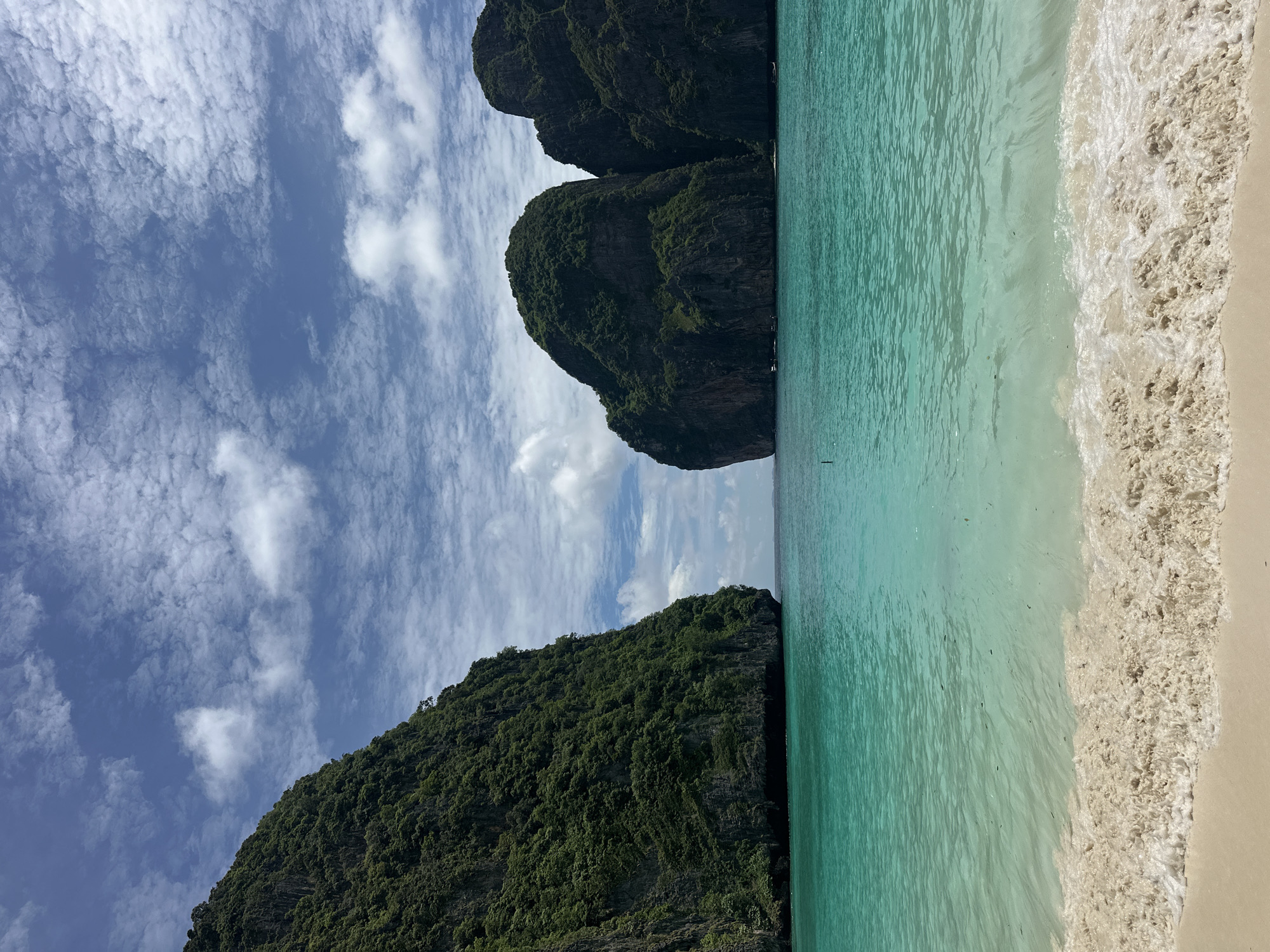 Turquoise bays and a beached jellyfish along Ao Nang's coast