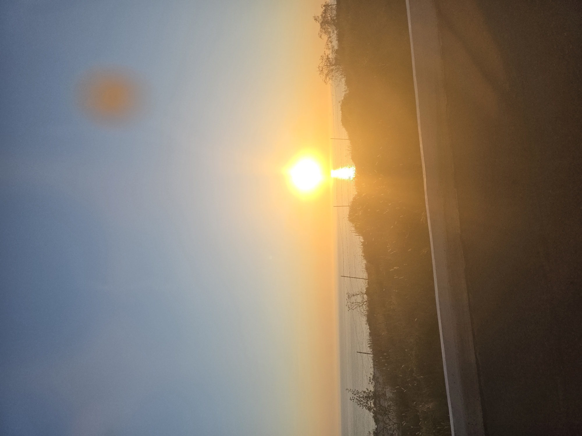 Vibrant ocean sunset photographed from Ensenada vantage point
