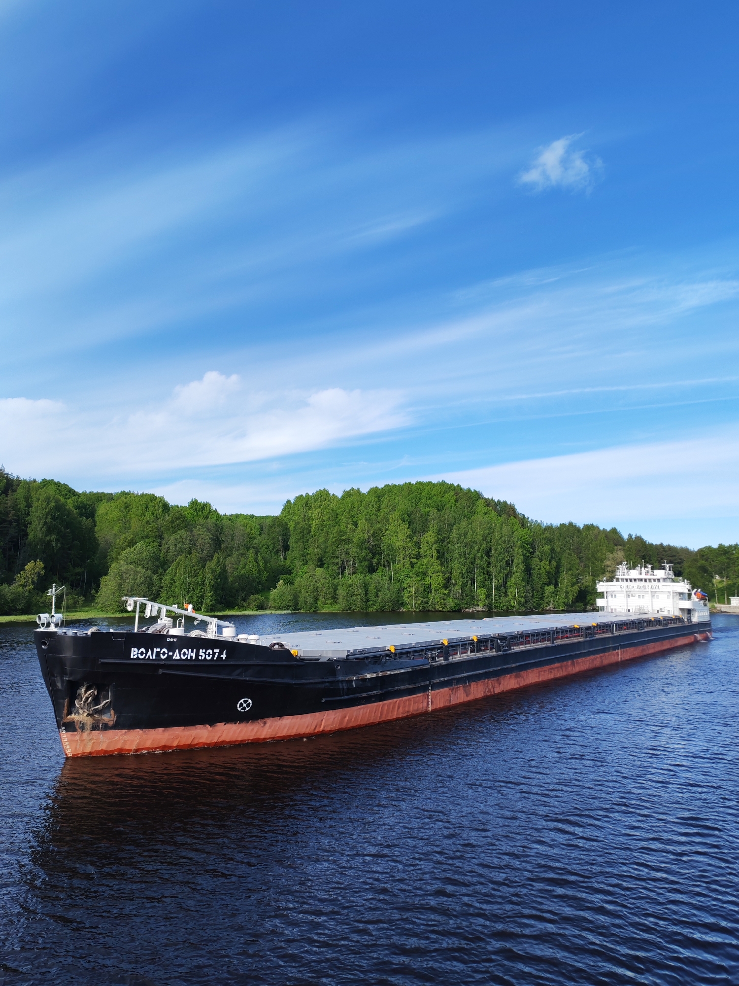 Cargo ship VOLGO-DON 5074 transits canal locks in Markovo