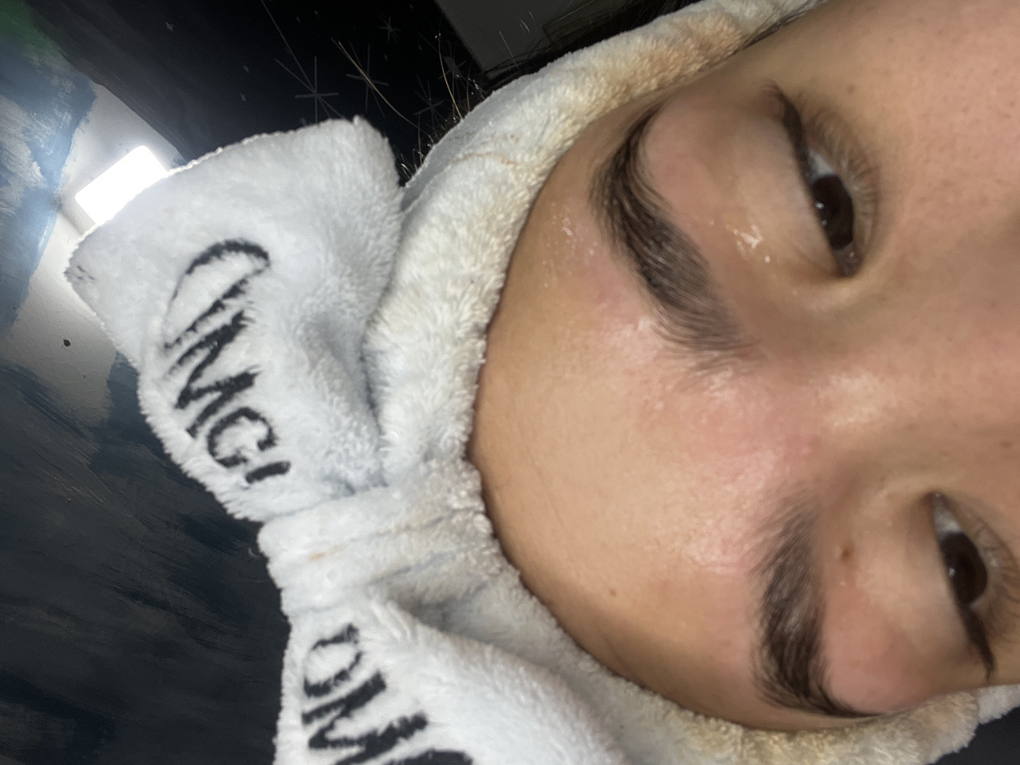 DIY eyebrow waxing at home, dogs lounging close by