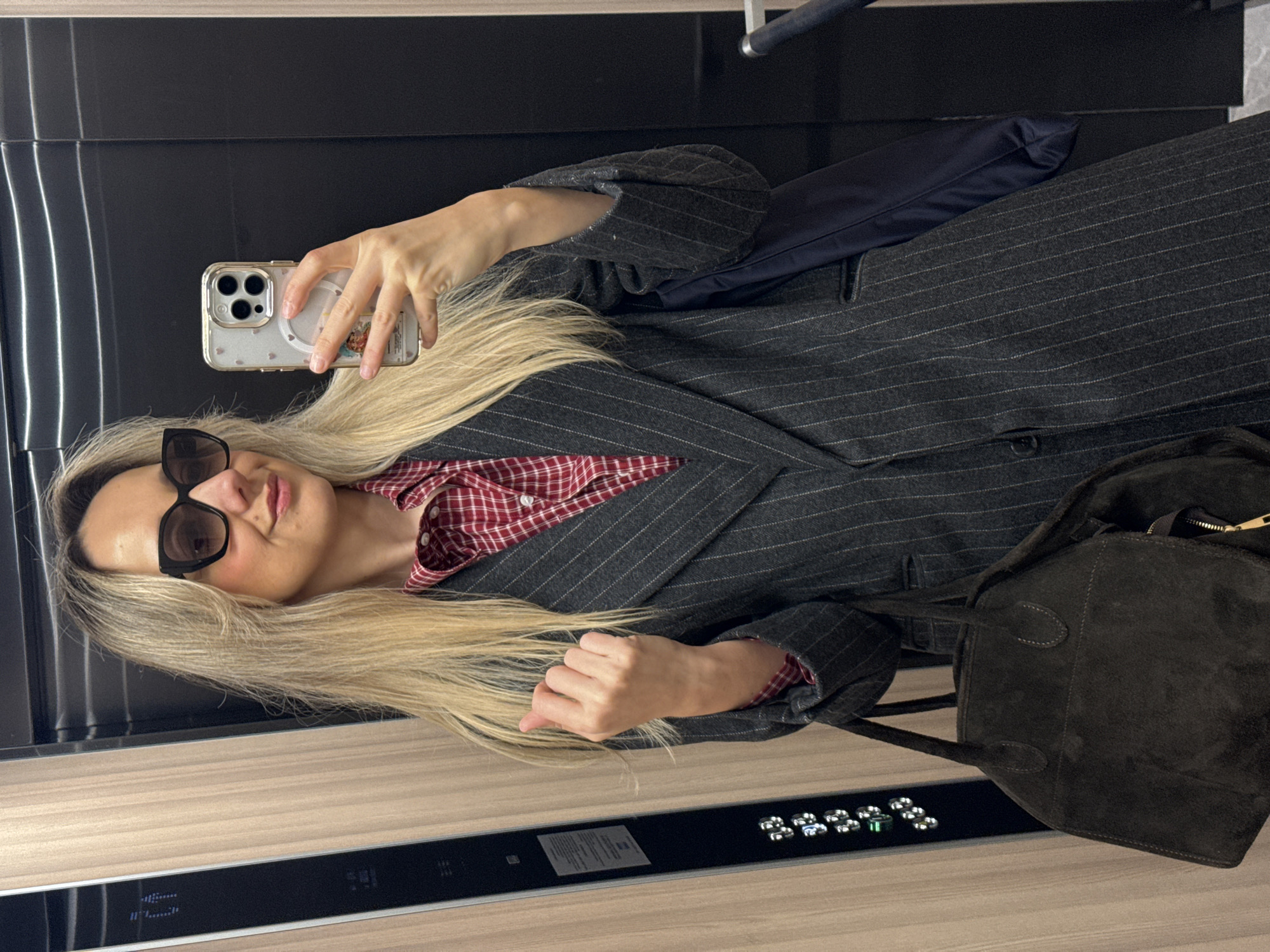 Morning selfies and champagne storage documented in Riga
