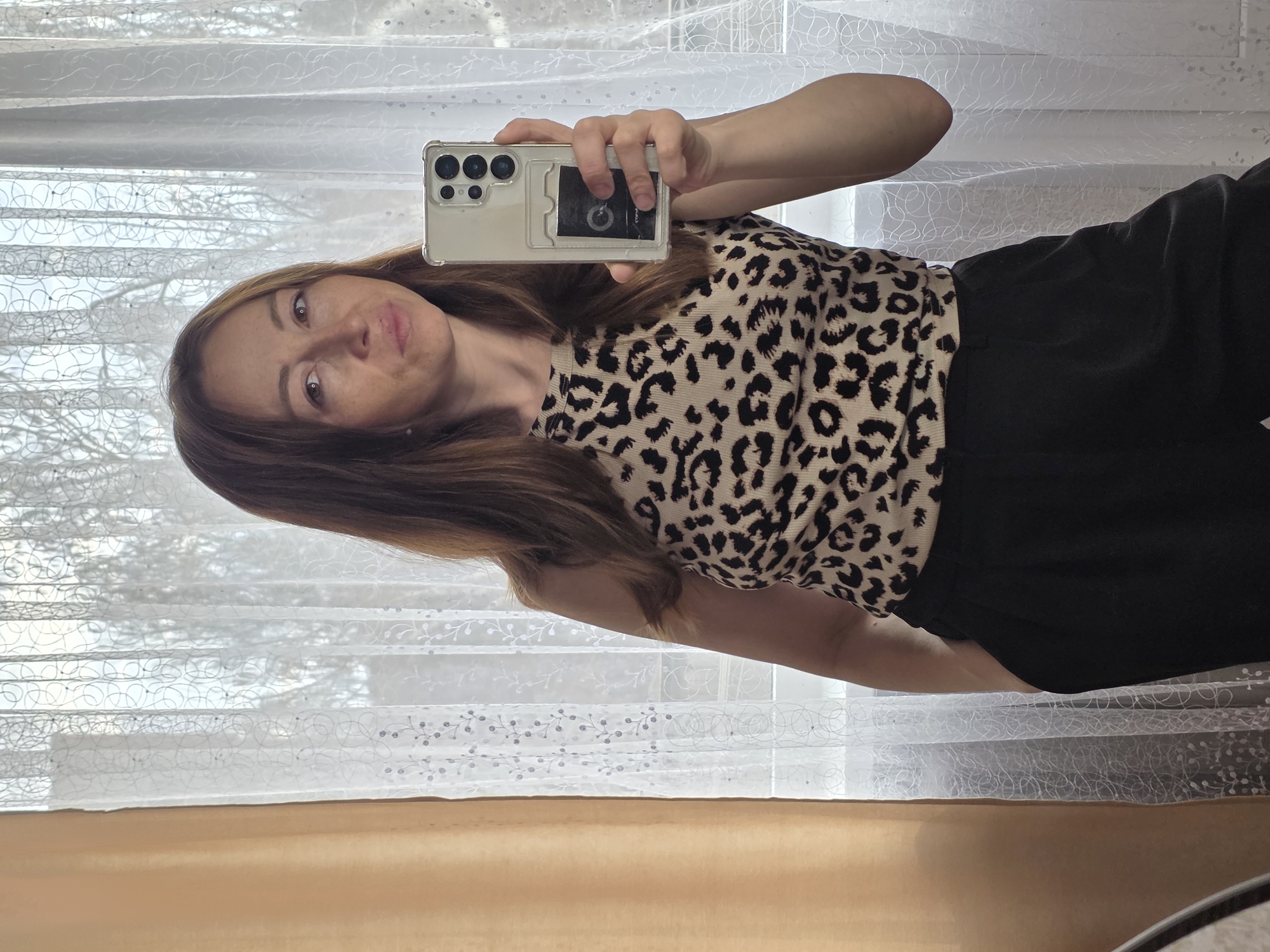 Woman documents early morning moments through selfies in Chaikovsky