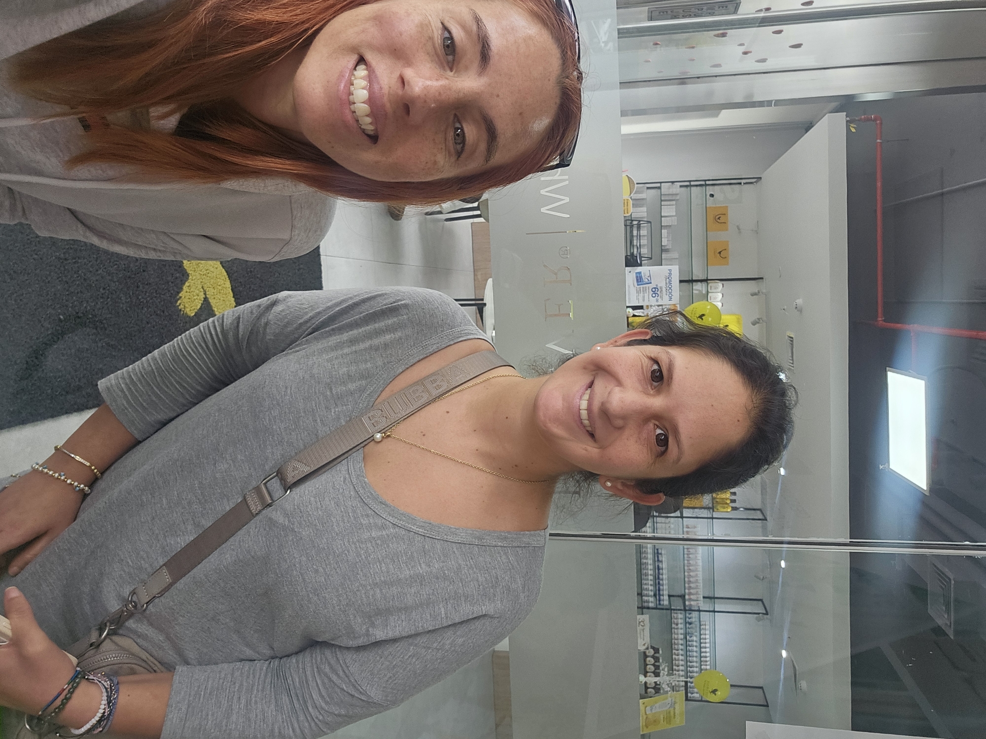 Two women meet in San Isidro business setting