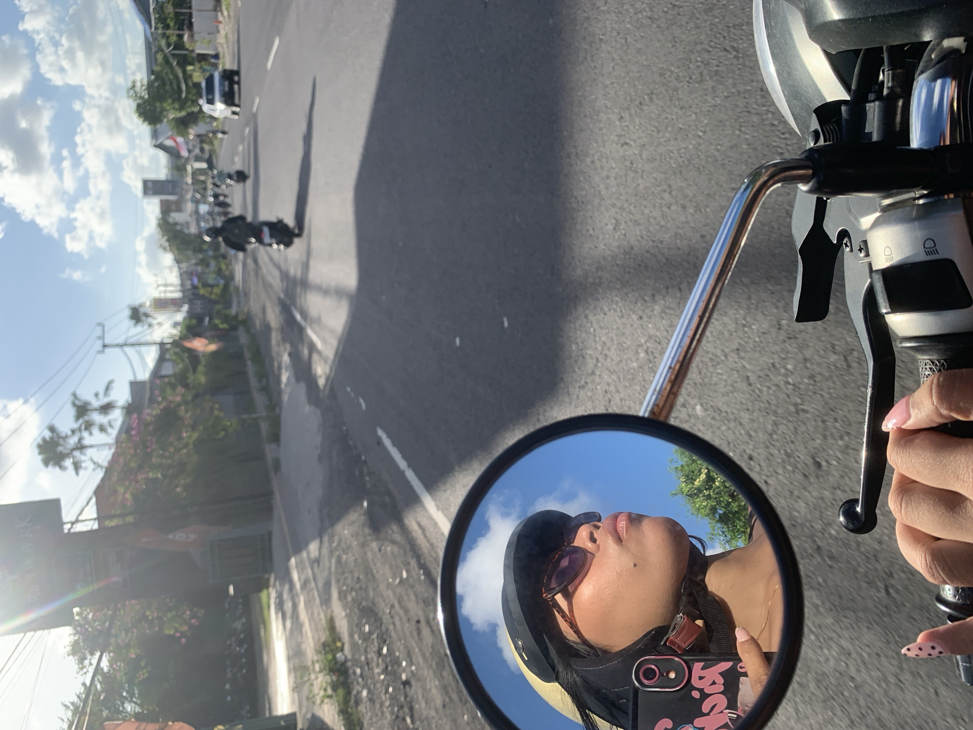 Weekday morning traffic rolling through Denpasar streets
