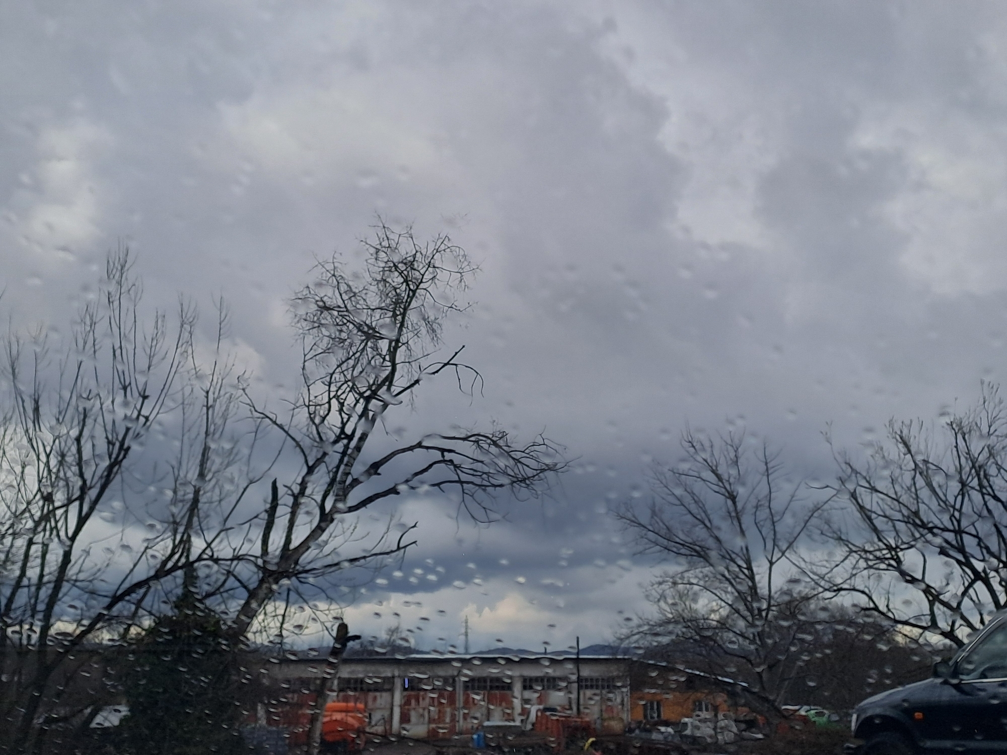 Spring rain observed through windows in Varshets, Bulgaria