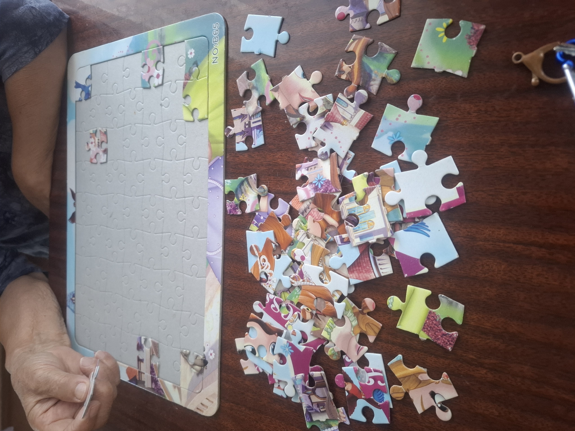 Puzzle building and goofy selfies at home in Almaty