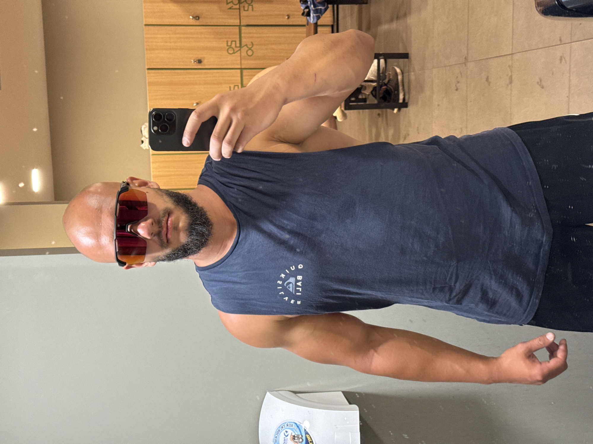 Post-workout mirror selfies in a Sofia gym locker room