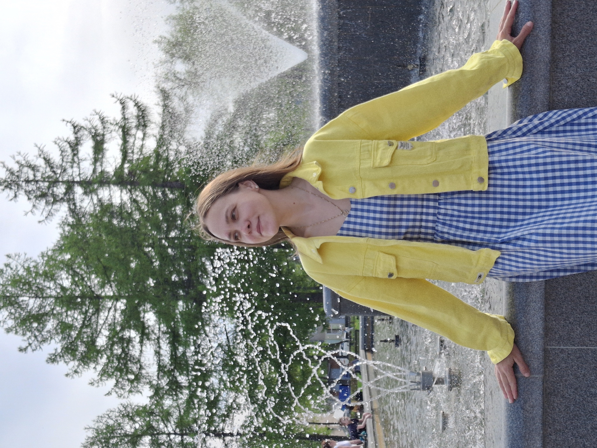 Tourist photography session documented across Chaikovsky, Russia parks and fountain