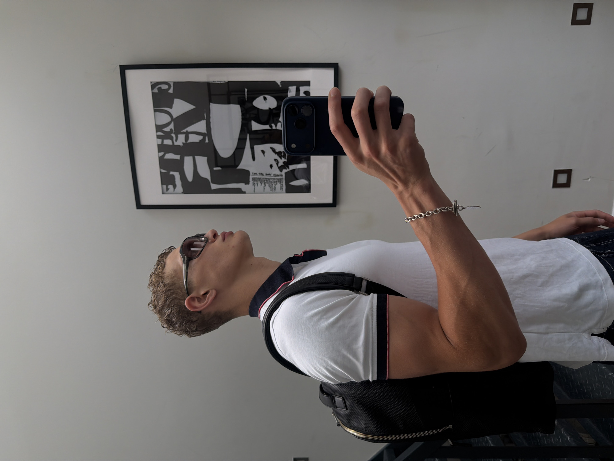 Mirror selfie, white polo and wide-leg jeans, London morning