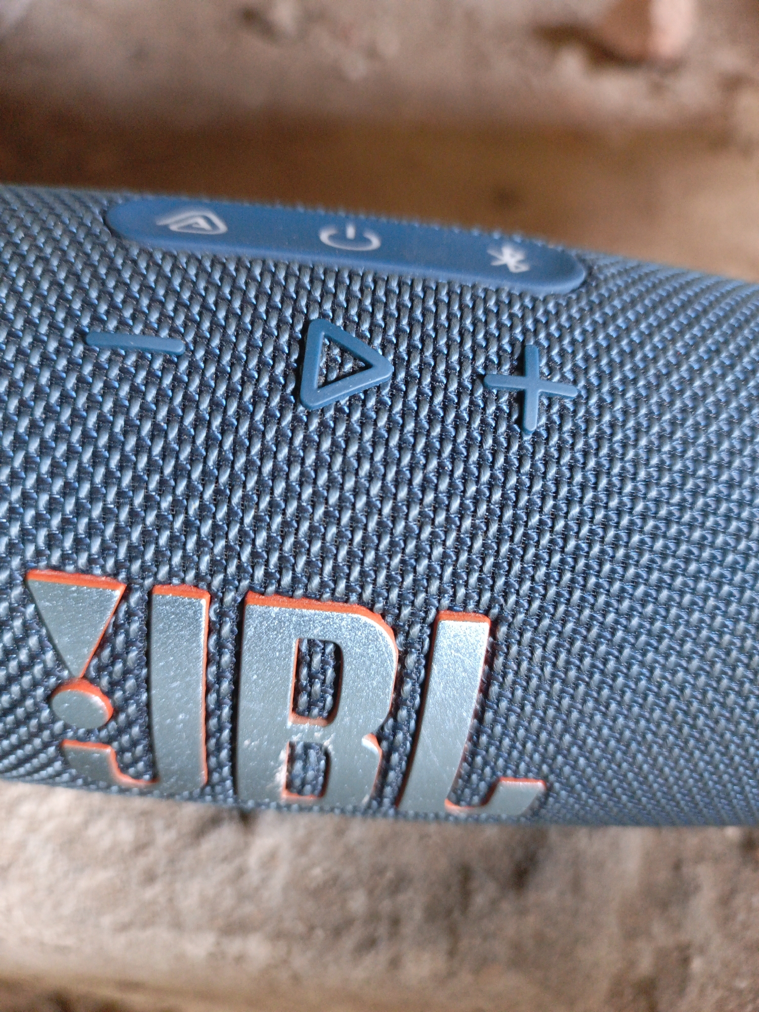 Personal items documented: JBL speaker and Action Bitters bottle