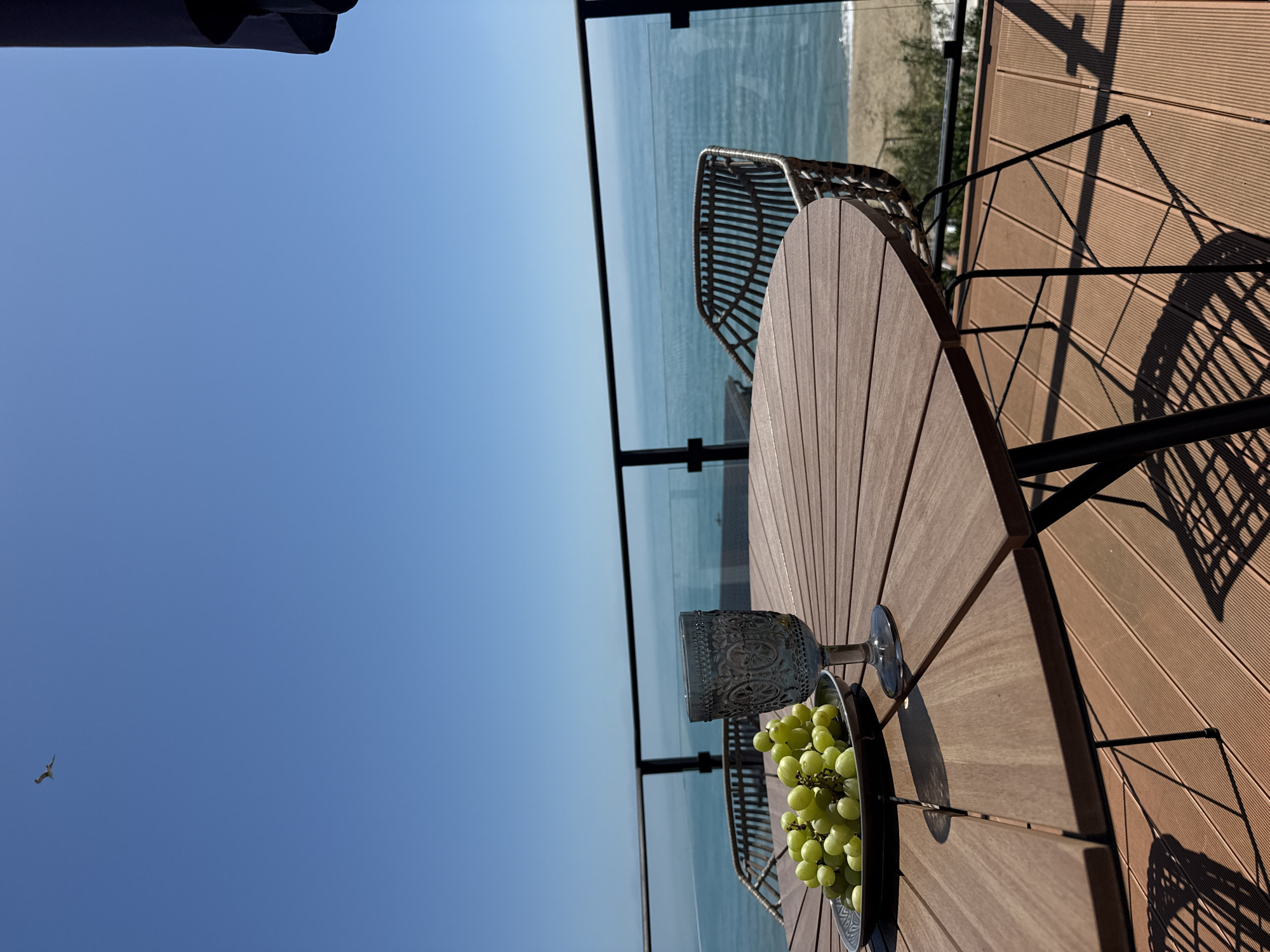 Morning deck dining scene overlooking Black Sea in Varna