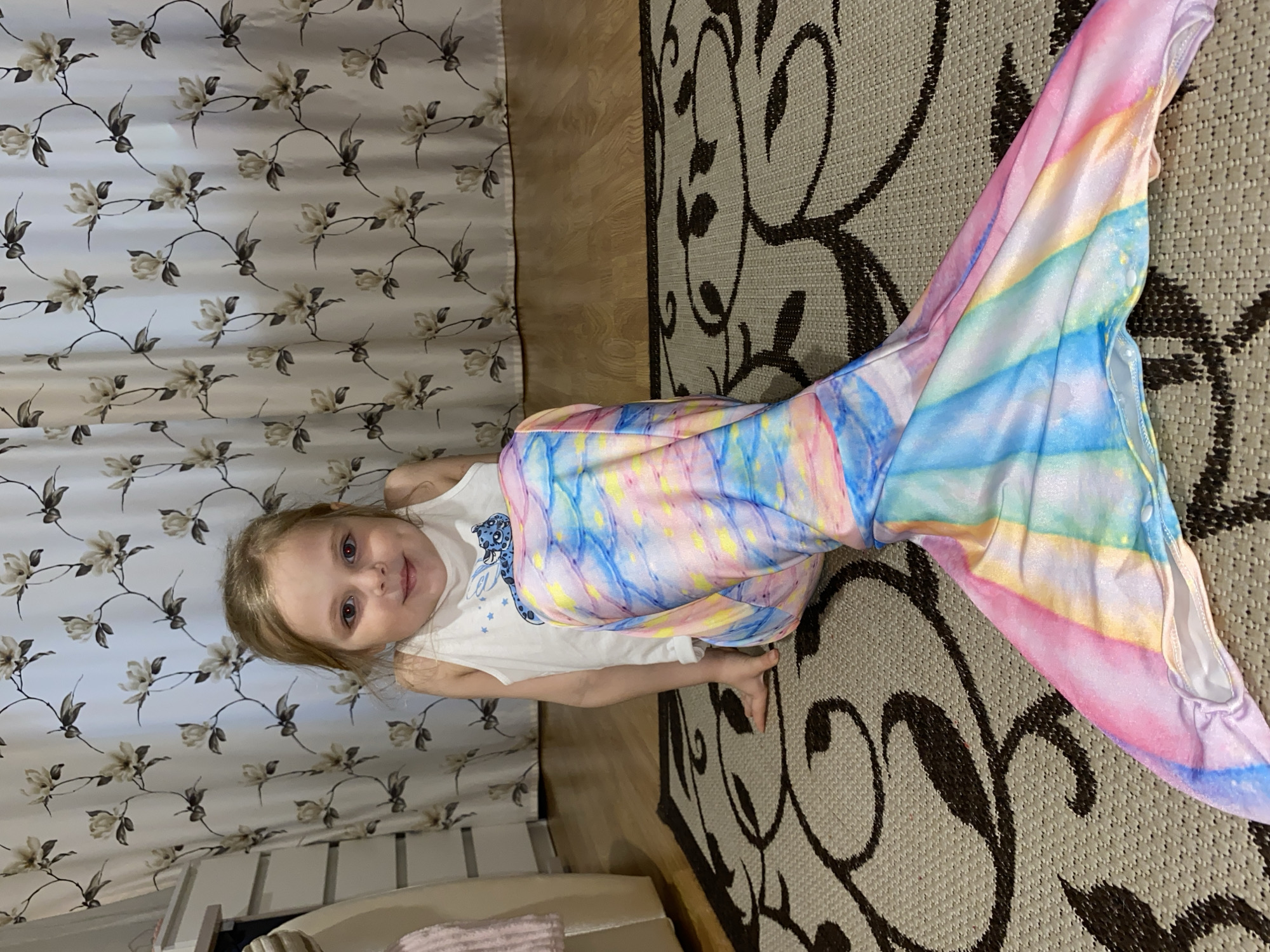 Child plays on couch in Votkinsk home