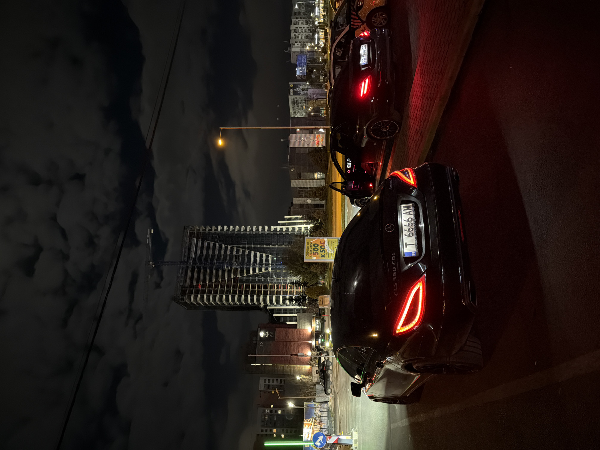 Nighttime social outing documented with luxury cars and dining