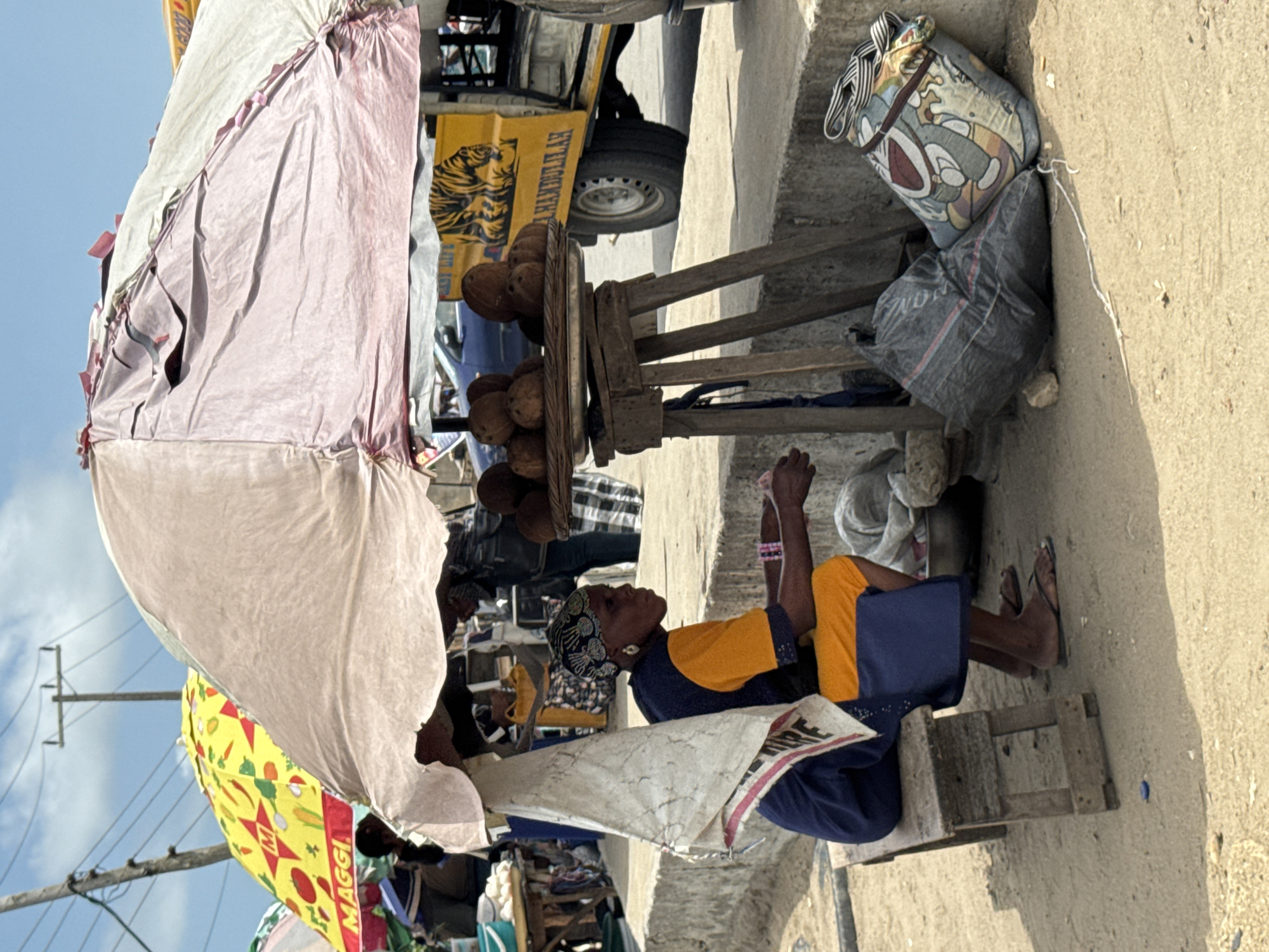 Street food vendors serve customers from makeshift stalls in Ajara