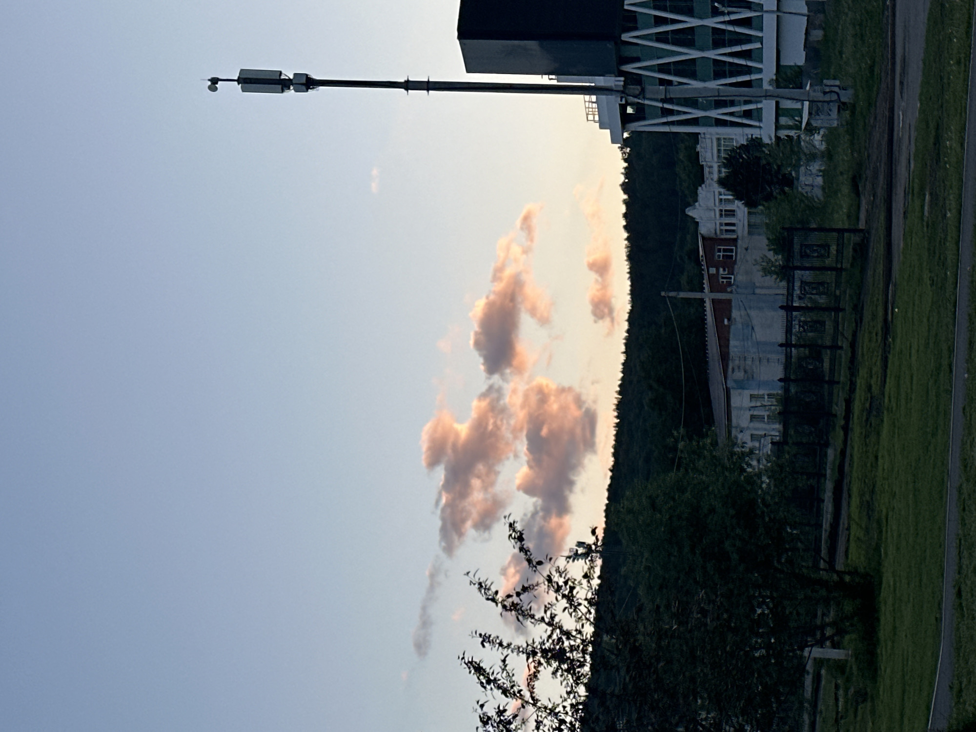Witness documents mixed urban-natural landscape during afternoon walkthrough