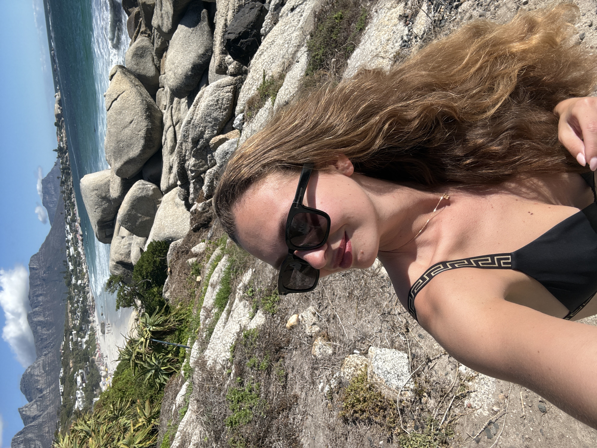 Beach day activities captured at Cape Town's Camps Bay