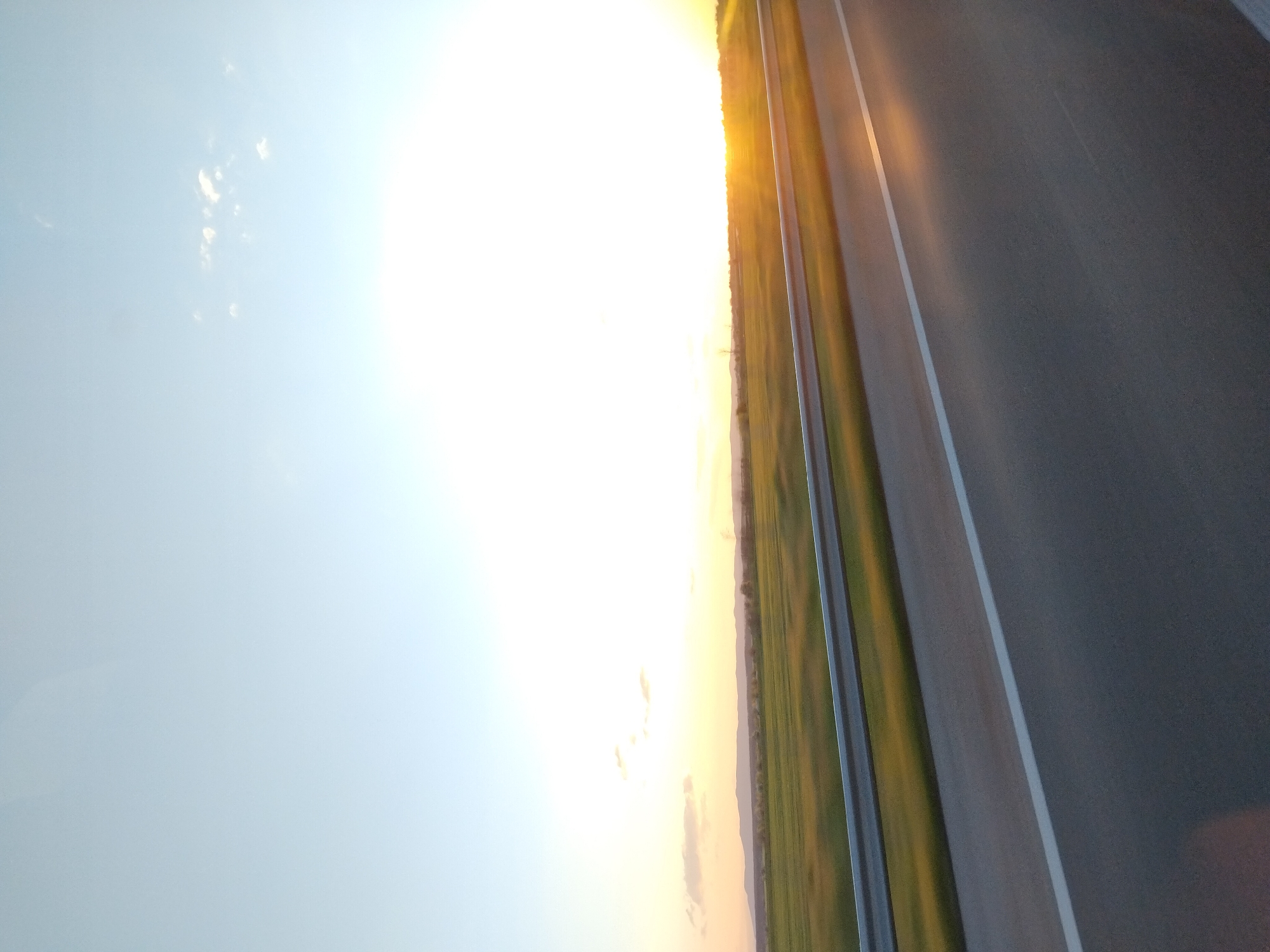 Sunset documented on rural road in Opalchenets, Bulgaria