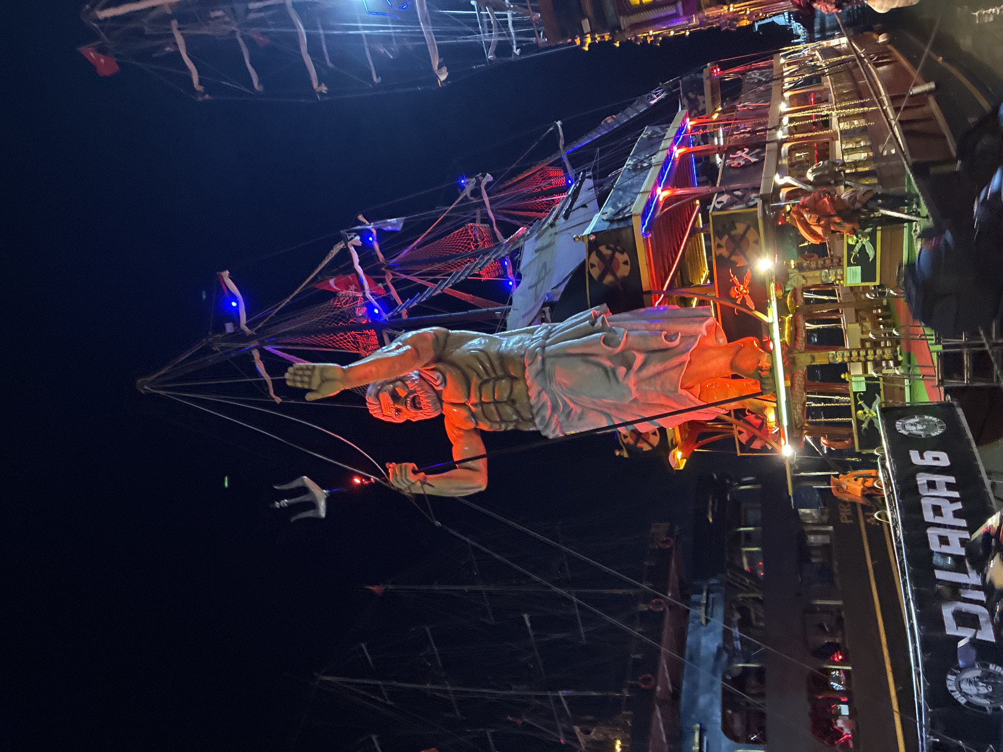 Alanya's harbor at night: pirate boats, street life, neon glow