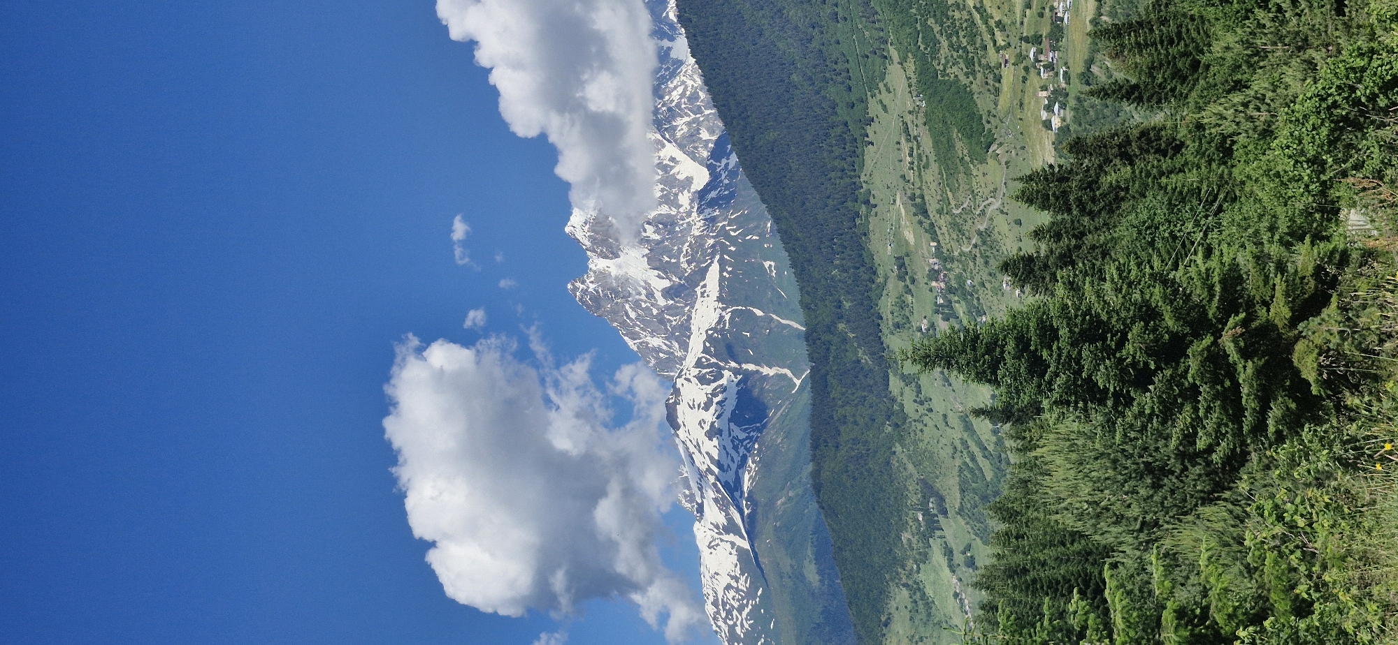 Snow-capped peaks and rural village views from multiple angles