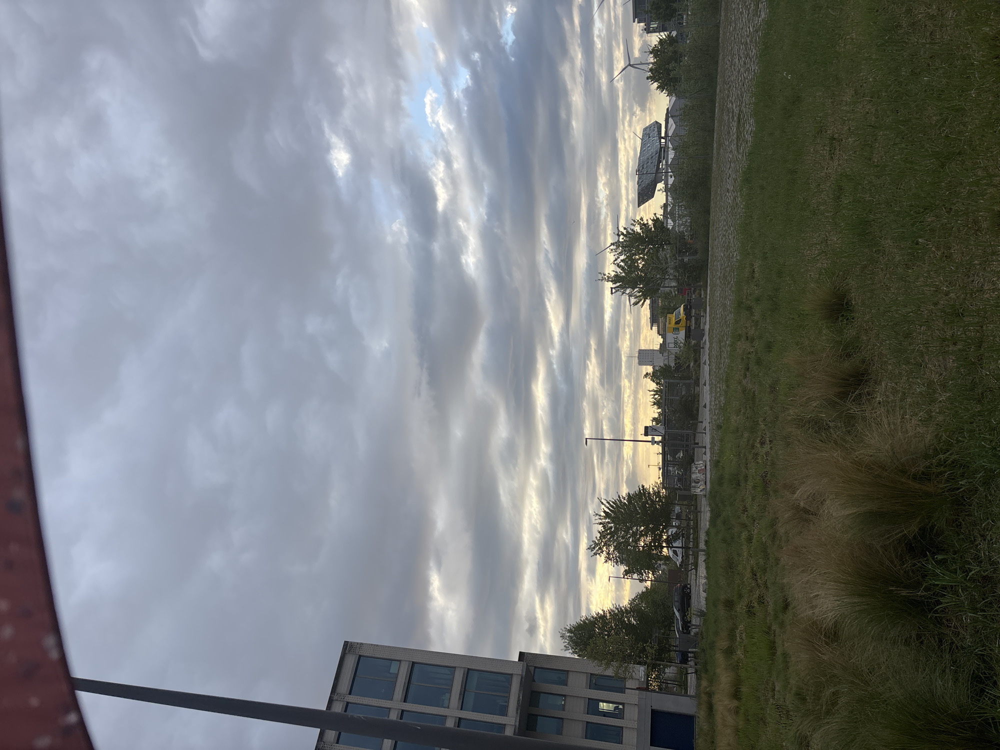 Witness documents Antwerp waterfront and industrial scenes under cloudy skies