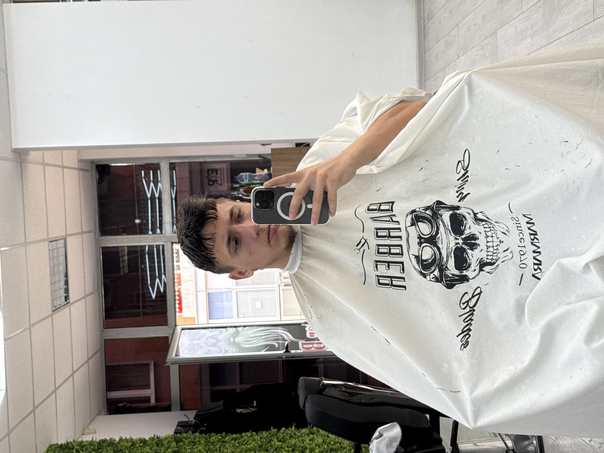 Man documents barbershop visit with selfies in Sofia