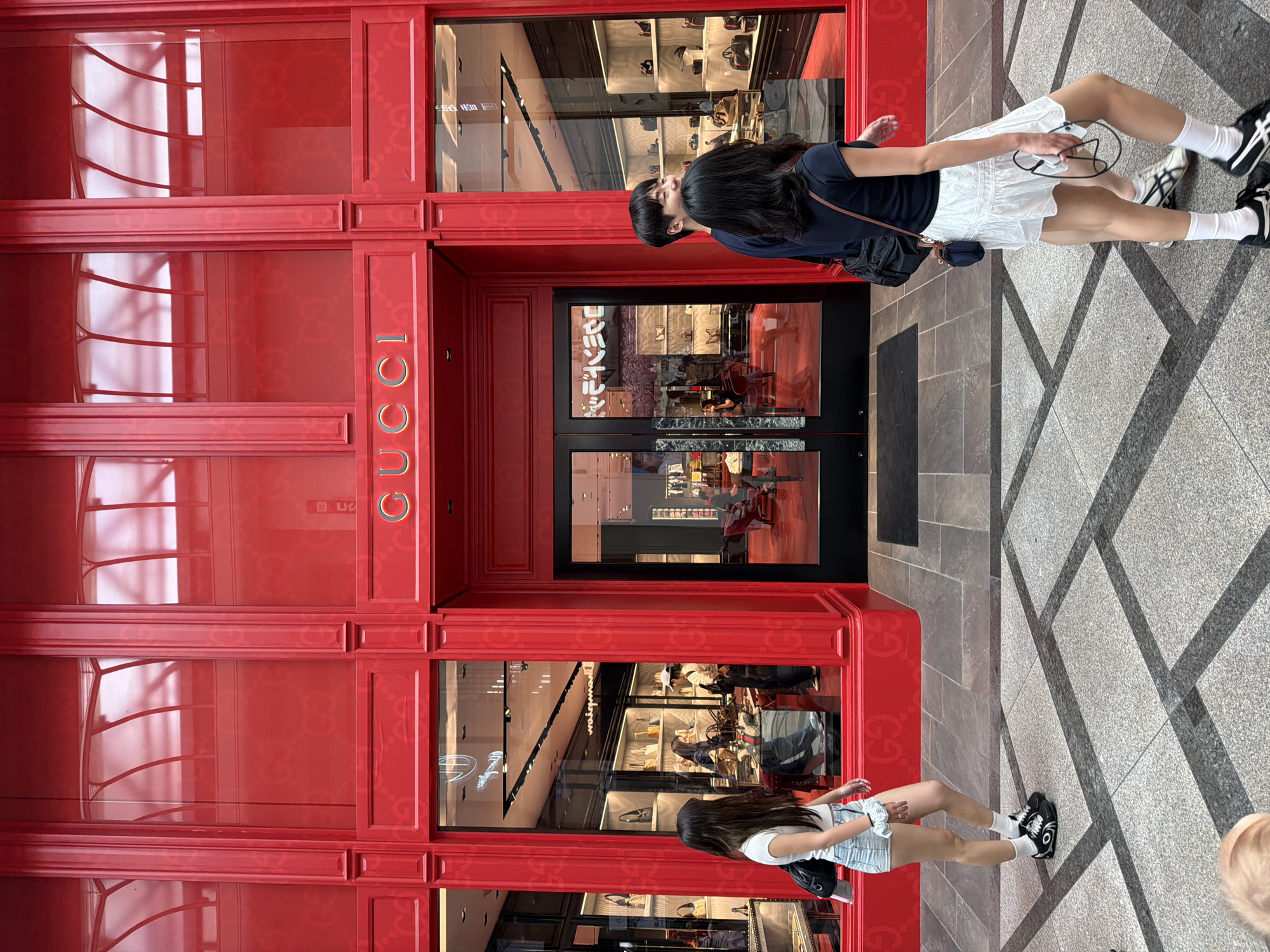 Early morning shoppers browse major retail stores in Osaka