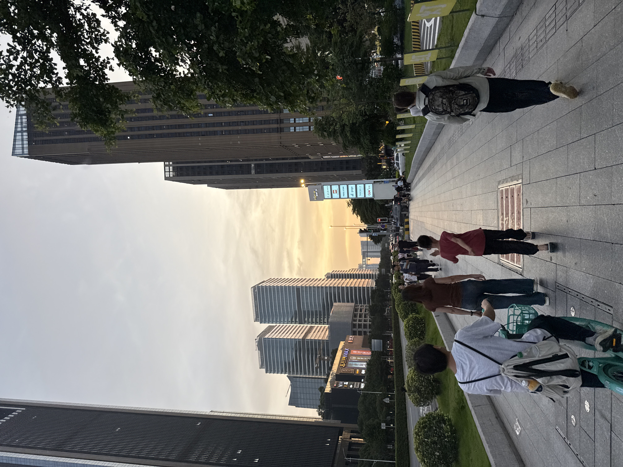 Morning pedestrians navigate crosswalks in Haizhu District, China