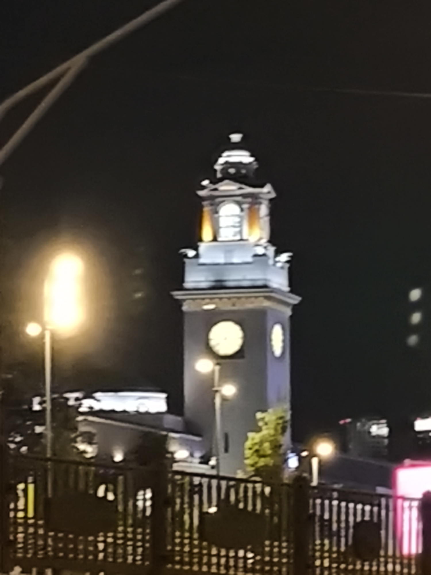 Moscow night out: neon streets, ornate tower, decorated restaurant interior