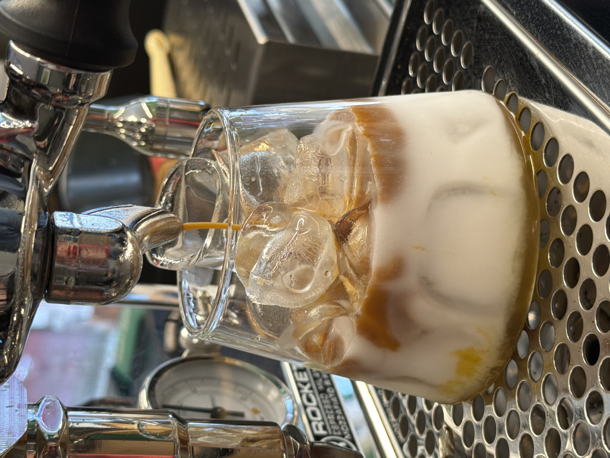 Iced latte prep and presentation at a Sofia café