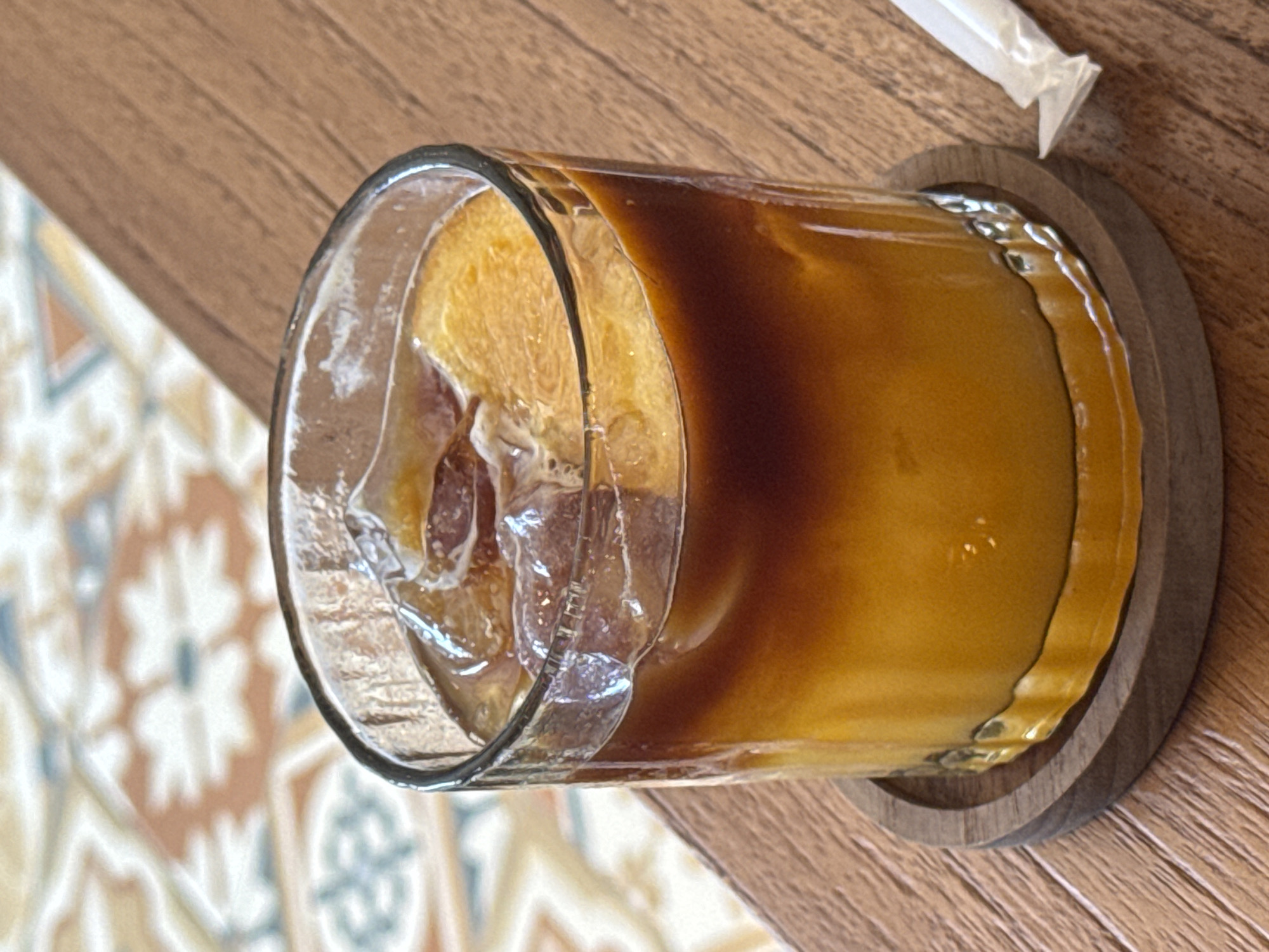 Late night iced coffee moment captured in Ungasan, Indonesia