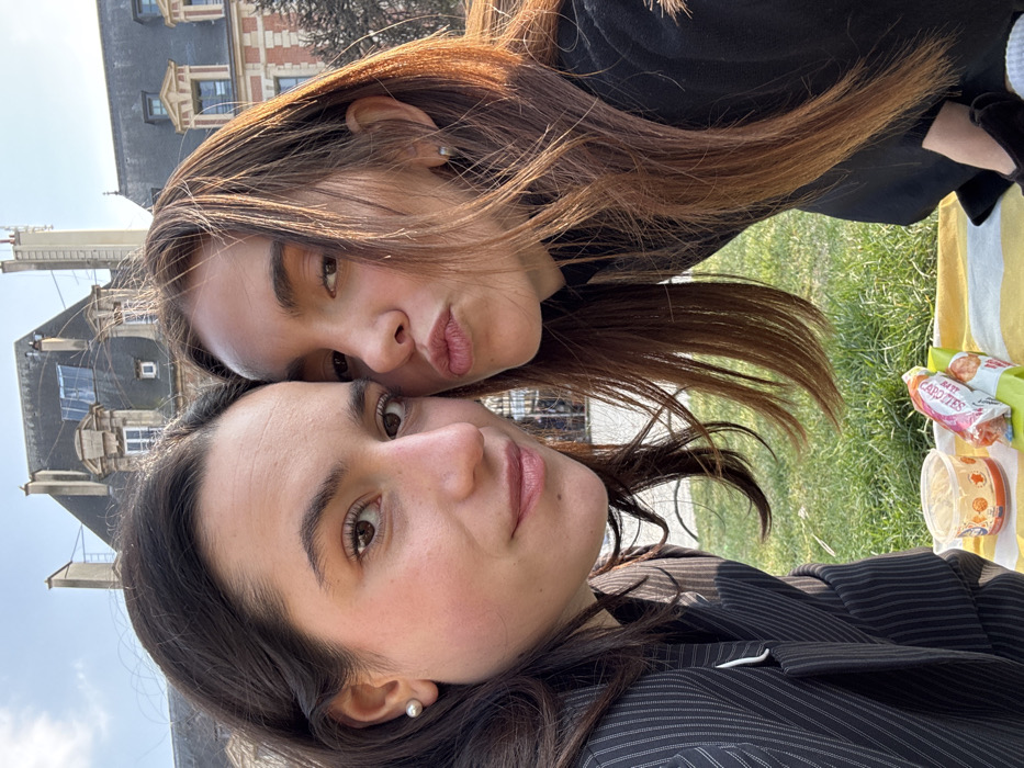 Friends enjoy sunny afternoon picnic at Paris's Place des Vosges