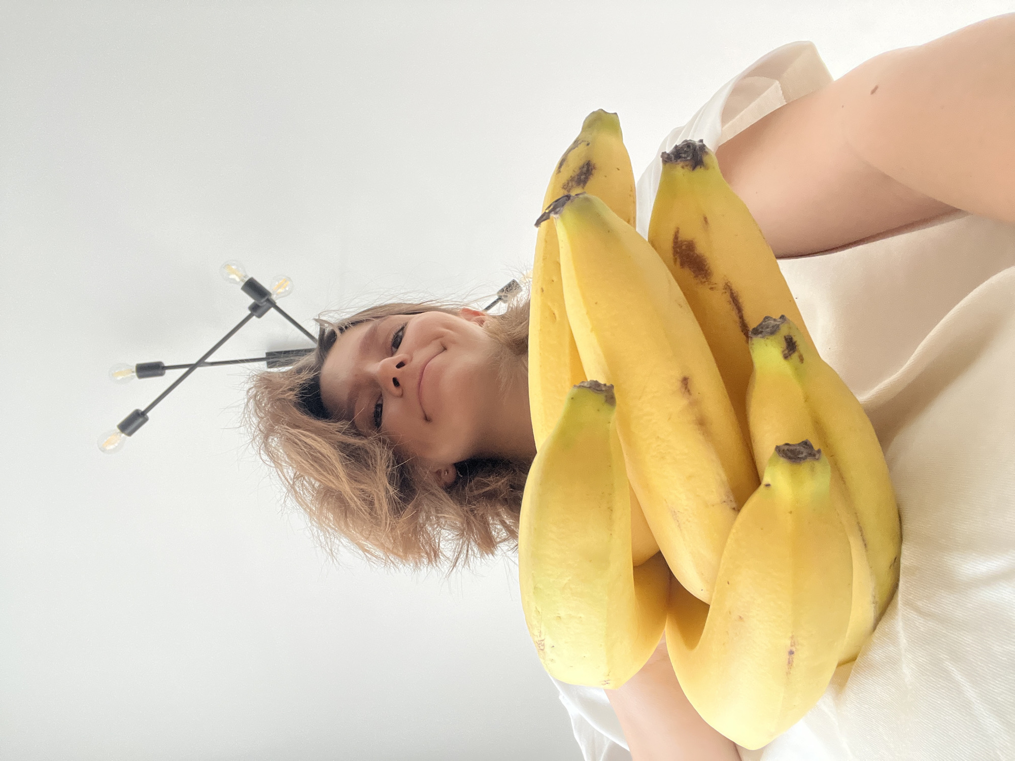 Playful banana poses and child meal prep documented in Cyprus