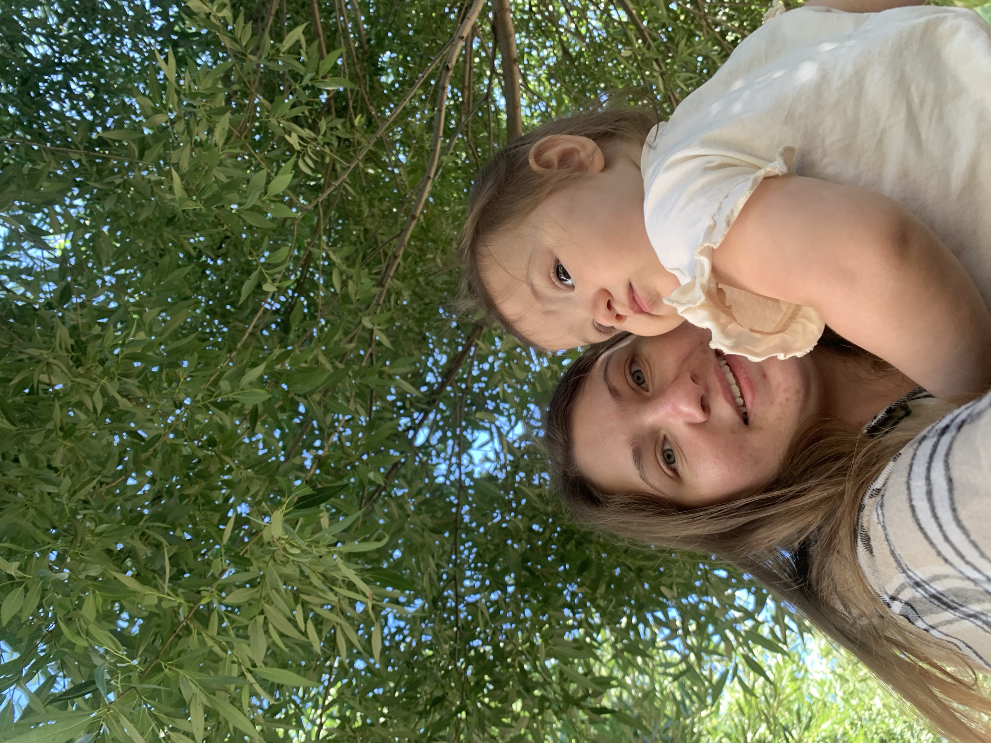 Sunny playground afternoon with a toddler in Chaikovsky, Russia