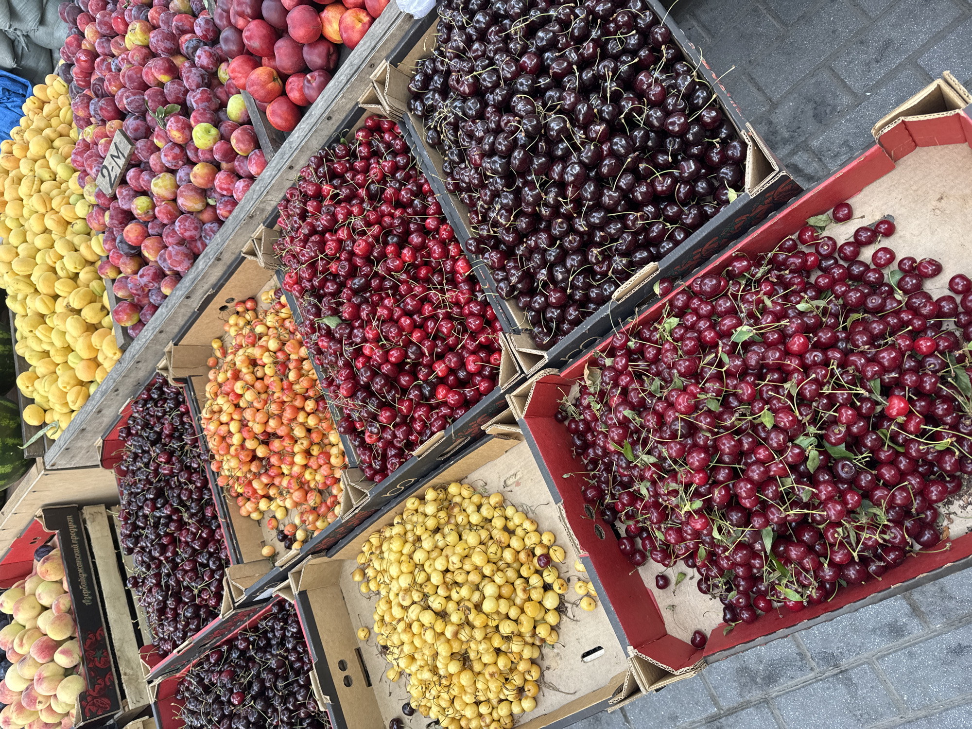 Summer market stalls full of fresh produce in Baku