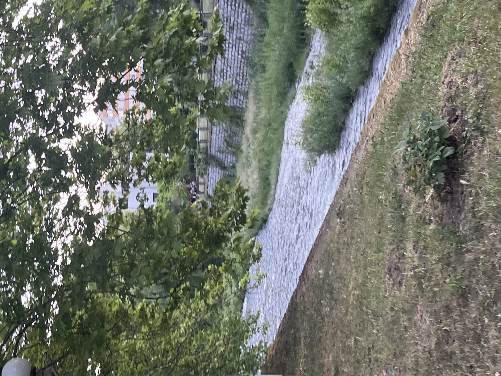 Person documents walking tour through Blagoevgrad's urban waterways and campus