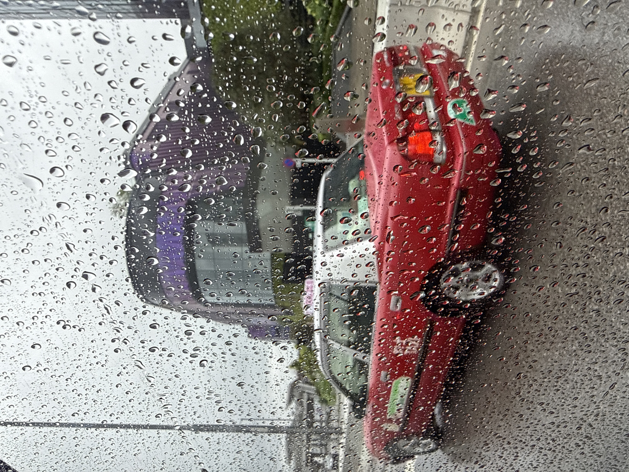 Rainy morning street scene captured in Hong Kong